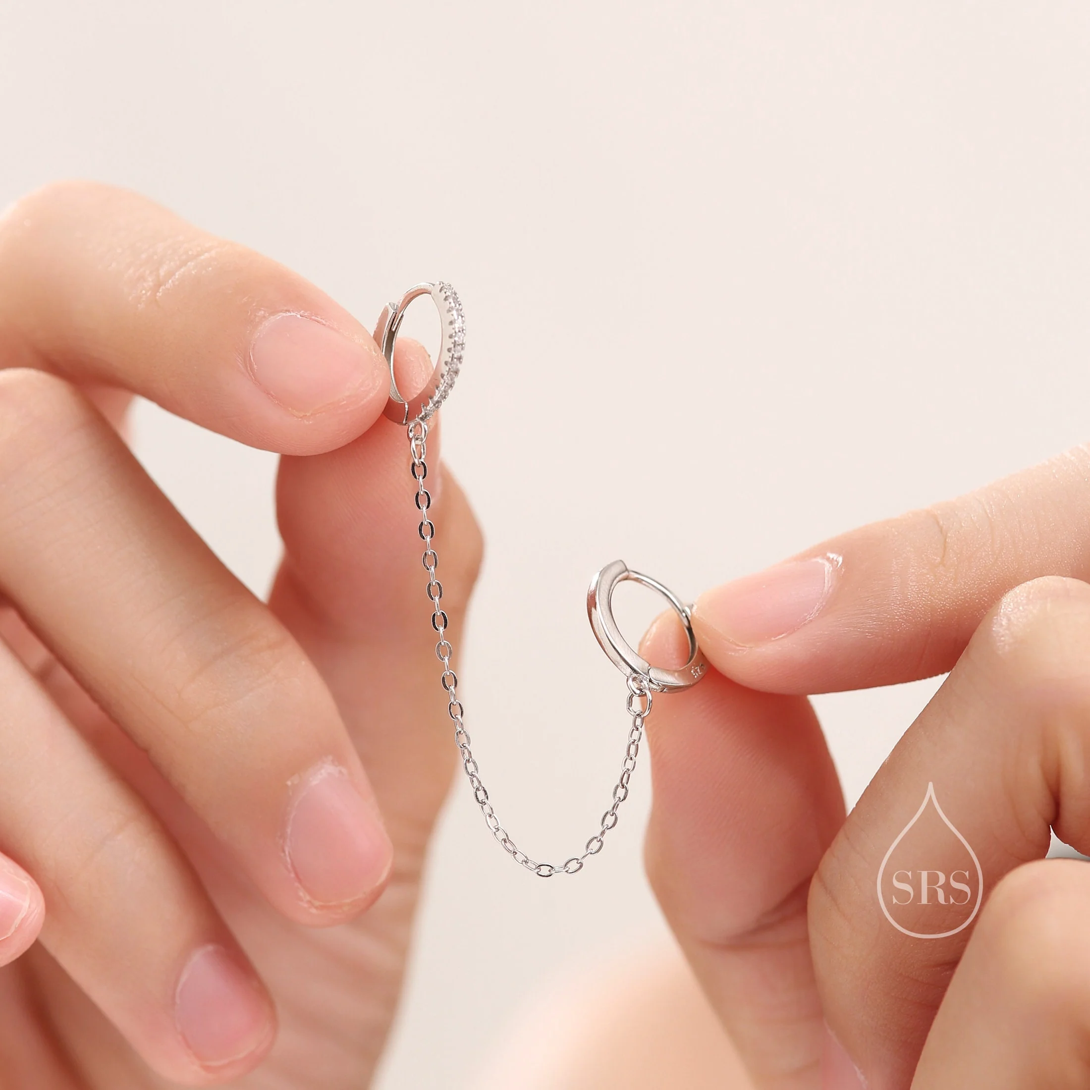Asymmetric CZ Huggie Hoop Earrings with a Linking Chain, Chained Hoop Earrings, Linked Hoops, Linked Crystal Hoops - Image 3