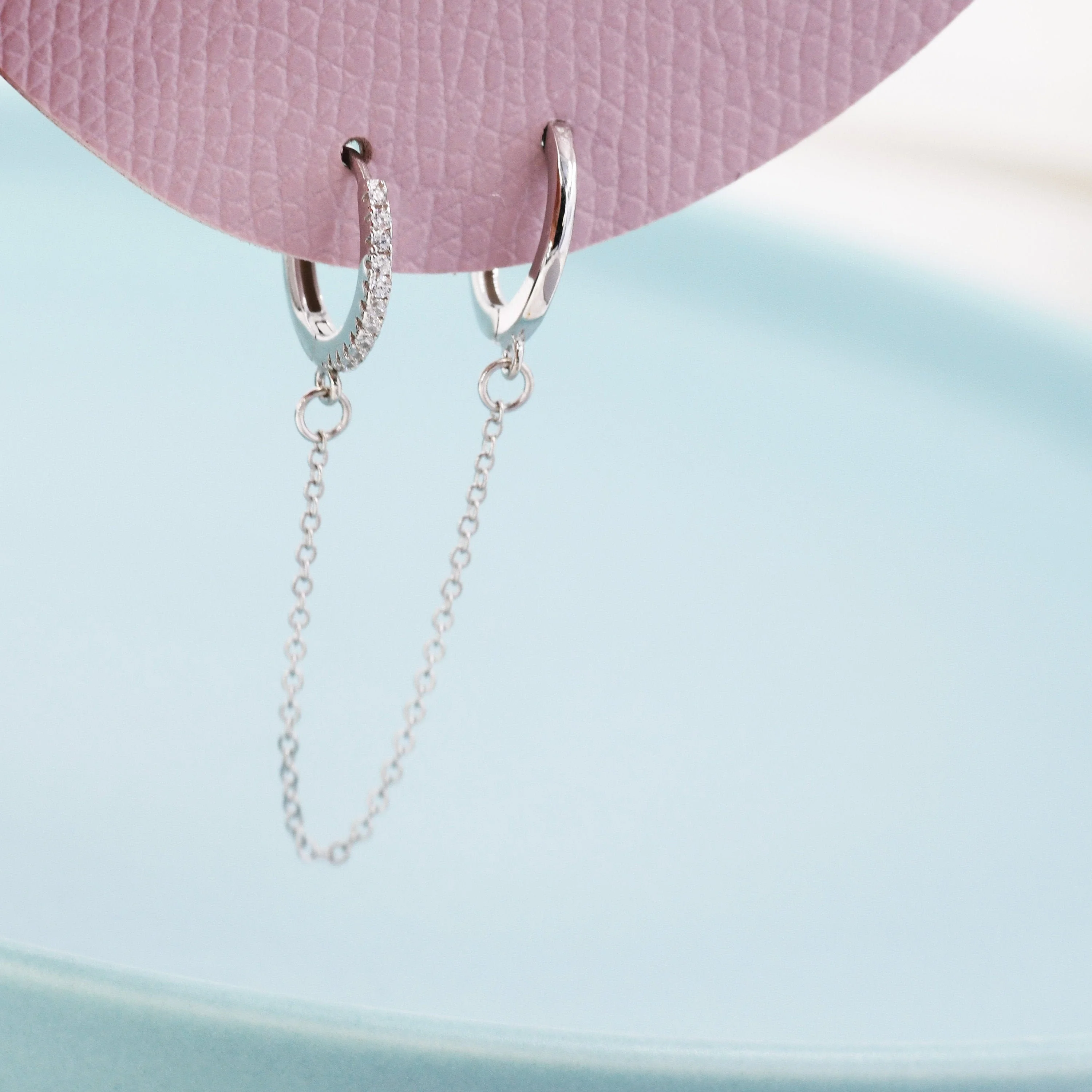Asymmetric CZ Huggie Hoop Earrings with a Linking Chain, Chained Hoop Earrings, Linked Hoops, Linked Crystal Hoops - Image 8